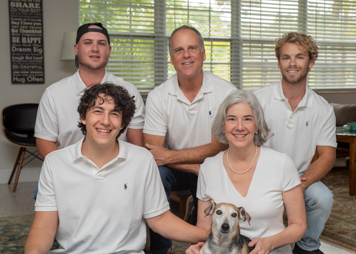 Michael and Laurel James with their three sons and family dog